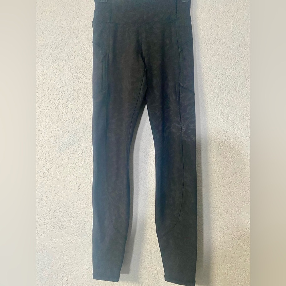 Athleta Black Rainier Reflective Tight black animal print leggings